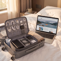 Gray travel electronics pouch in real-life use