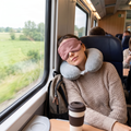 Rose colored travel sleep mask in real-life use